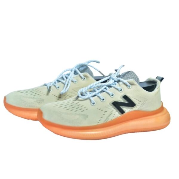 NEW BALANCE Womenβs Orange Running and Lifestyle Sneakers.